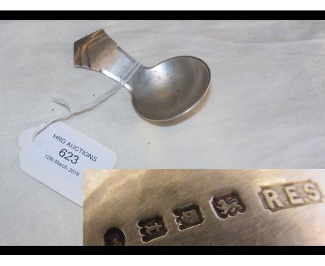 A silver caddy spoon by R E Stone 