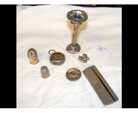 A silver mounted comb, thimble, etc. 