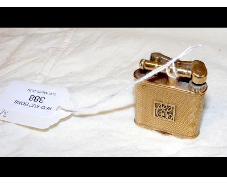 A 9ct gold Dunhill lighter - 4.5cm CONDITION REPORTGood condition, monogram to front, lighter not tested; Height 4.5cms, Widt