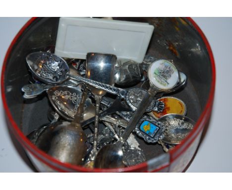 A collection of white-metal souvenir teaspoons and souvenir cigarette case and lighter Condition Report: Available upon reque