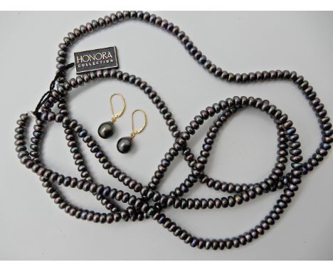 A long string of Honora black pearls with 14k gold clasp and 18ct gold mounted black pearl earrings Condition Report: Availab