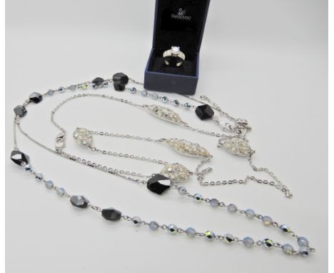 Two Swarovski necklaces and a ring Condition Report: Available upon request
