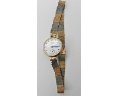 A 9ct gold vintage Tissot wristwatch, with 9ct woven strap (af) weight including mechanism 23.6gms Condition Report: Strap di