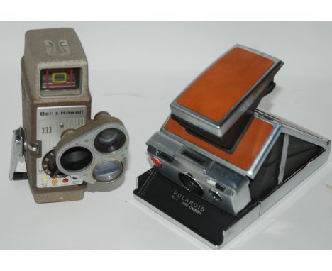 A Bell &amp; Howell cine-camera, folding polaroid camera, hip flask etc Condition Report: Available upon request