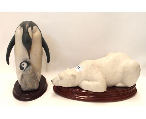 Two Lladro gres figures including Snow King no 8413, and Penguin Love no 8414, designed by José Javier Malavia, both with woo