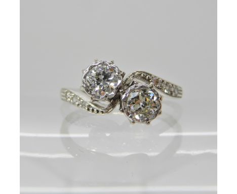 An 18ct white gold and platinum twin stone diamond ring of estimated approx 0.40cts, finger size O1/2, weight 2.8gms Conditio