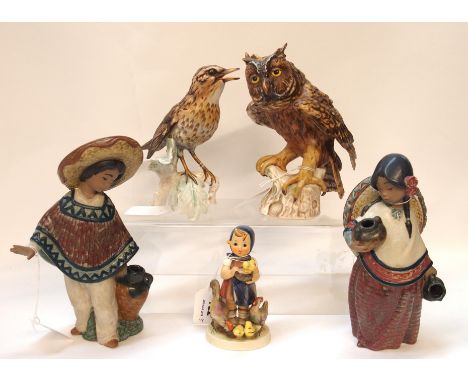 A pair of Lladro figures of Mexican children, 19.5cm high, a Goebel figure of a Thrush, 16cm high, another of a Screechowl, 1