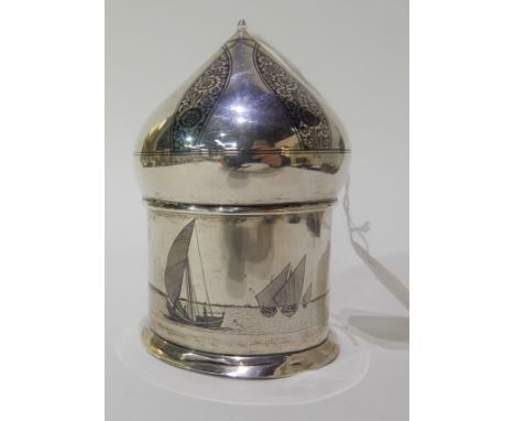 A white metal tea caddy with Niello Arabic sailing vessel and sea fortifications, 183gms Condition Report: Available upon req