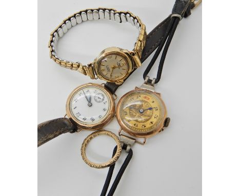 Three 9ct cased ladies vintage watches and a gem set eternity ring size K1/2 Condition Report: Available upon request