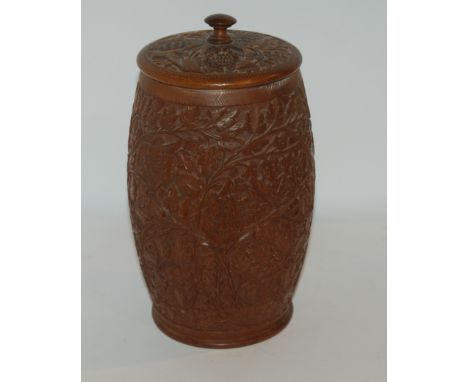 A carved oak tobacco jar and cover with white-metal interior, 24cm high, carved cigarette case and Universal Avometer Conditi