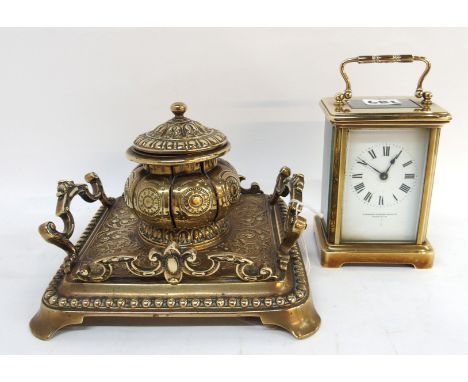 A cast brass desk inkwell and a four glass carriage clock Condition Report: nice condition . 