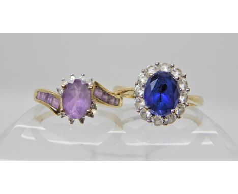 A 14ct gold blue and white gem set QVC ring size U1/2, weight 3.1gms and a 9ct gold amethyst and diamond ring size T1/2, weig