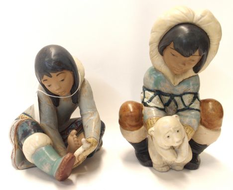 A Lladro gres figure Poor Little Bear no. 2232 designed by Juan Huerta, 20cm high, together with another figure of an Eskimo 