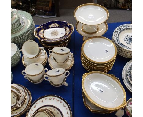 A Charles Ahrenfeldt, Limoges dessert set comprising; two tall tazzas, two square shaped dishes, two oval shaped dish and twe