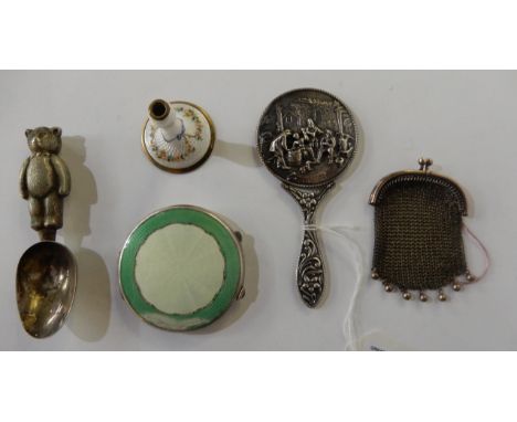 A lot comprising a miniature hand mirror embossed with a village scene and figures, 12cm long, a silver compact, a mesh purse