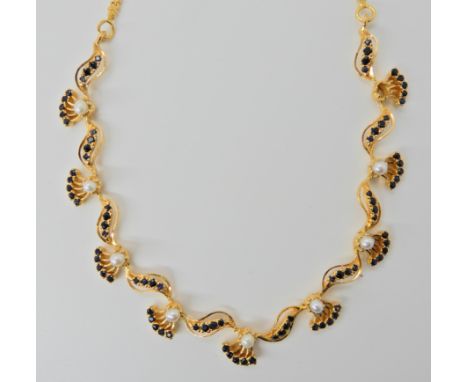 A bright yellow metal sapphire and pearl necklace, length 38cm, weight 18.5gms Condition Report: One pearl missing otherwise 