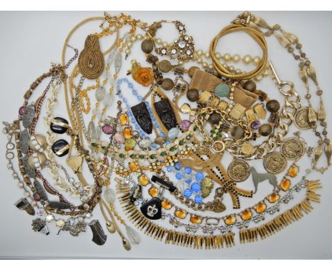 A bag full of vintage costume jewellery to include, Monet, Vanderbilt, Czech glass beads Condition Report: Available upon req