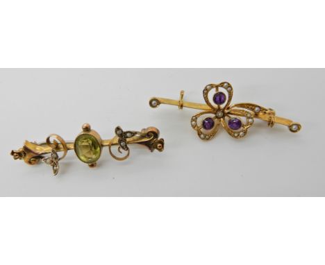 A 9ct gold green gem and pearl brooch and a 15ct gold amethyst and pearl brooch (af), weight for both 5gms Condition Report: 