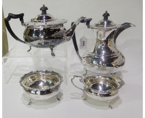 A four piece silver tea service by Henry Atkins, Sheffield 1922 (one dent in hot water pot), 1559gms Condition Report: Availa
