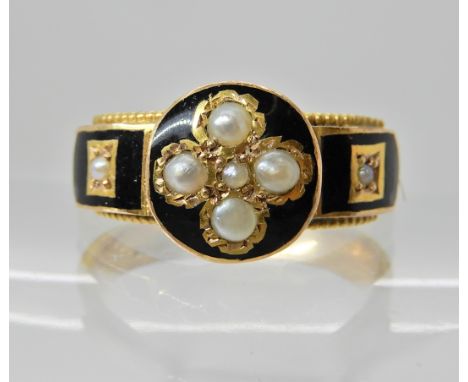 A bright yellow metal hair mourning ring with black enamel, pearls and hair insert, finger size Q, weight 3.1gms Condition Re