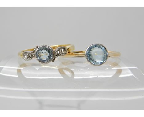 An 18ct gold aquamarine and diamond ring size P and an 18ct gold blue gem set ring size R1/2, weight 5.1gms Condition Report: