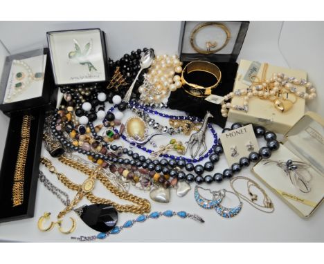 A Joan Rivers bangle watch, Preston &amp; York hummingbird brooch, Monet items and a collection of costume jewellery Conditio