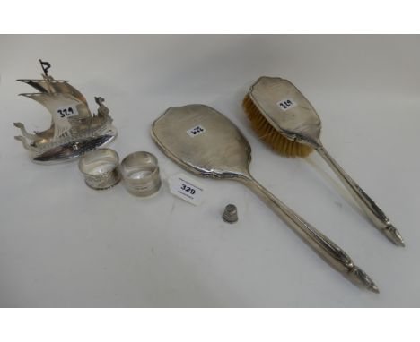 A tray lot of silver and EP - a brush and mirror set, Birmingham 1929, silver napkin ring, EP napkin ring, thimble and a lett
