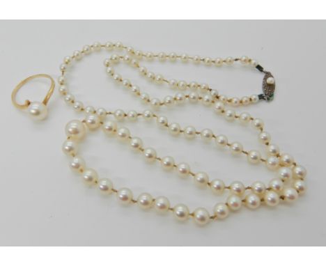 A string of Mikimoto pearls with a silver Mikimoto stamped clasp, length 58cm, together with a Mikimoto pearl ring size L1/2 