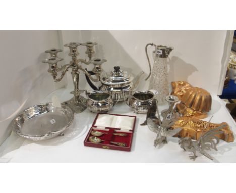 A tray lot of EP - candelabrum, tea service, basket, cockerel figures Condition Report: Available upon request