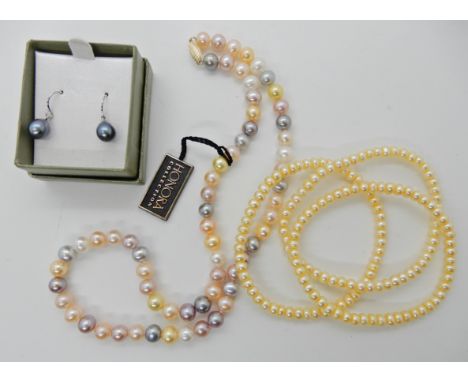 A Honora pearl necklace with a 14k gold clasp three yellow pearl bracelets and a pair of earrings Condition Report: Available