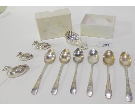 A Mappin &amp; Webb caddy spoon, two silver teaspoons, Edinburgh hallmarks, three sterling silver ducks, 5cm, 4cm and 3cm lon