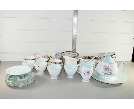 TRAY CONTAINING MAINLY CERAMICS, TEA WARES, CUPS, SAUCERS, TEA POT, IN FLORAL DESIGN BY ROYAL ALBERT