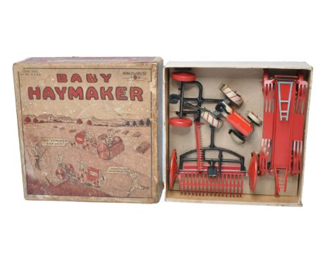 Animate (USA) 1920's Tinplate Baby Haymaker Tractor and Implement Set. Contents display excellent as shown, in fair to good o