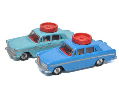 Corgi duo of Austin A60 Driving School issues comprising dark and lighter blue variations. Darker issue is excellent, lighter