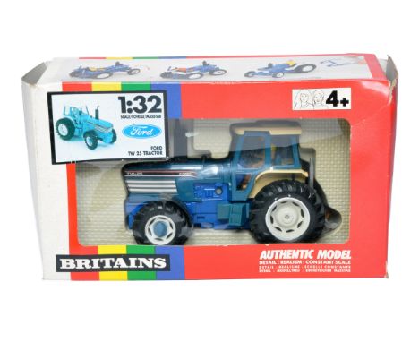 Britains Farm 1/32 diecast model issue comprising No. 9508 Ford TW25 Tractor. Very good to excellent (some minor wheel melt) 