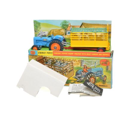 Corgi Gift Set No. 33 Fordson Power Major Tractor and Beast Carrier Trailer. Tractor has orange plastic hubs. Displays excell