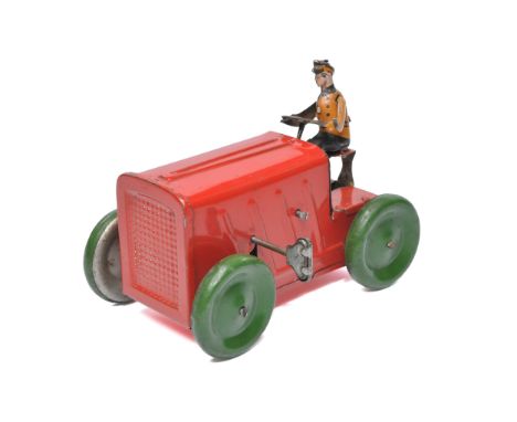 Greppert &amp; Kelch German mechanical tinplate tractor and driver, 5" length. In good working order. Displays generally very