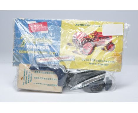 Airfix 1/20 plastic model tractor kit comprising the Ferguson Tractor. Kit is complete. Header card (fair) mounted on to card