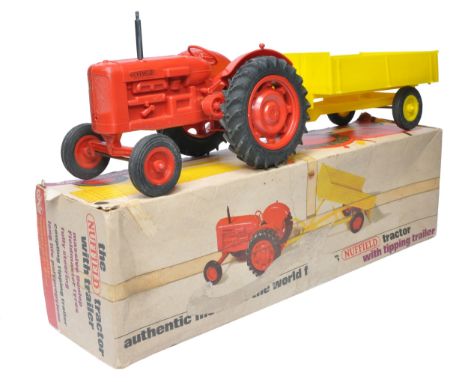 Raphael Lipkin / Pippin Toys Large (approx 1/16) plastic scale model of the Nuffield Universal Tractor and Trailer. Displays 