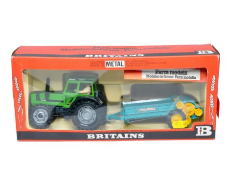 Britains Farm 1/32 diecast model issue comprising No. 9596 Deutz DX110 Tractor and (metallic green) Manure Spreader Set. Gene