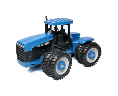 Scale Models 1/16 Diecast Farm Model issue comprising New Holland Versatile 9882 Tractor. Excellent. 