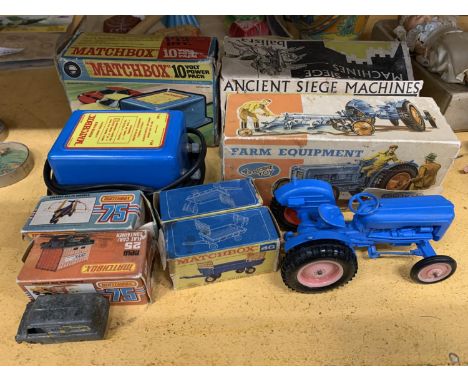 A MIXED GROUP OF TOYS TO INCLUDE BOXED CRESCENT TOYS TRACTOR, BOXED MATCHBOX 10 VOLT POWER PACK, MATCHBOX ETC 