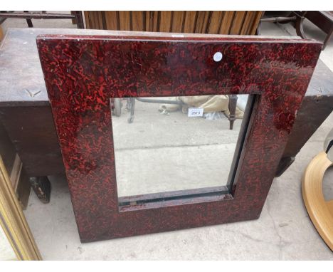 A MODERN RED LAQUERED WALL MIRROR, 24" SQUARE 