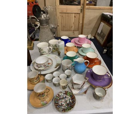 A LARGE QUANTITY OF ITEMS TO INCLUDE CUPS, SAUCERS, PLATES, EGG CUPS, CLARET JUG, CANDLE HOLDER, ETC 