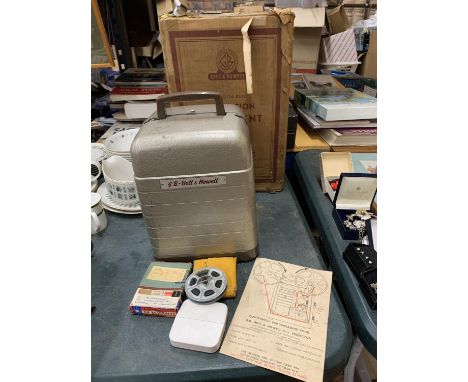 A VINTAGE G. B. BELL &amp; HOWELL 8MM PROJECTOR TO INCLUDE ORIGINAL BOX, INSTRUCTIONS, ETC 