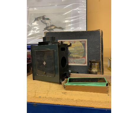 A BOXED VINTAGE MAGIC LANTERN AND SLIDES SET 