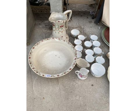 AN ASSORTMENT OF CERAMIC ITEMS TO INCLUDE A LARGE JUG AND WASH BOWL AND CROWN STAFFORDSHIRE CUPS AND JUG ETC 