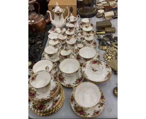 A LARGE QUANTITY OF ROYAL ALBERT 'OLD COUNTRY ROSES' TEAWARE TO INCLUDE A TEAPOT, COFFEE POT, CUPS, SAUCERS, SOUP COUPES AND 