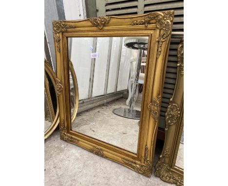 A MODERN GILT FRAMED WALL MIRROR, 26X21" 