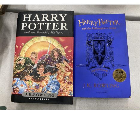 A FIRST EDITION HARDBACK COPY OF HARRY POTTER AND THE DEATHLY HALLOWS PLUS HARRY POTTER AND THE PHILOSOPHER'S STONE 